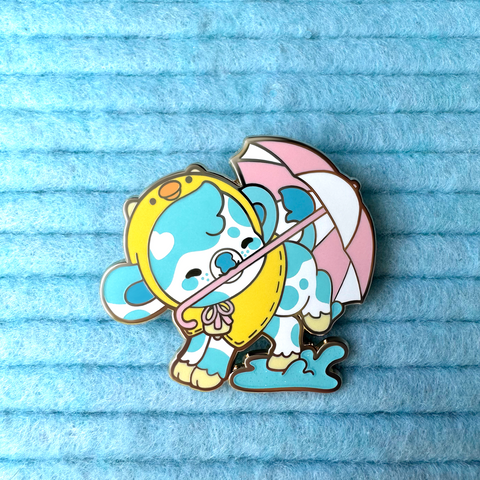 Ducky the Rain Cow Enamel Pin