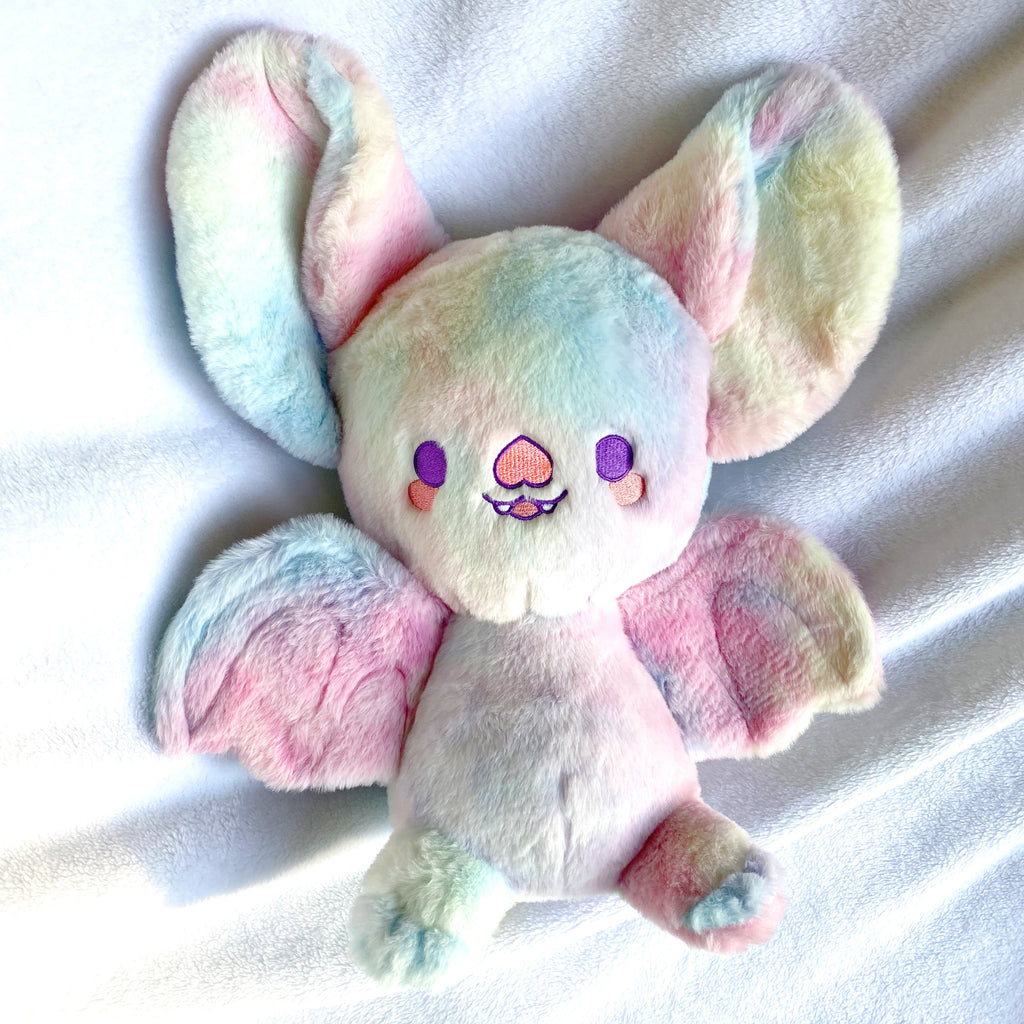 Plush toy of a rainbow bat