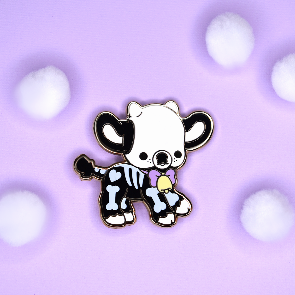 Rattle the Skeleton Cow Enamel Pin โ Bright Bat Design
